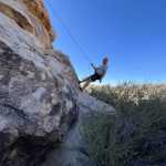 A person climbing a rock