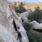A woman rock climbing